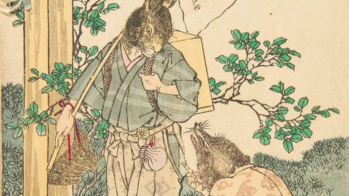 明治時代の浮世絵。薬箱を背負い、着物を着たウサギが、地面で苦しむ狸を覗き込んでいる。日本の民話『カチカチ山』で、ウサギが狸の火傷に辛子を塗る場面を描いた井上安治の作品。ボストン、イザベラ・スチュワート・ガードナー美術館蔵。